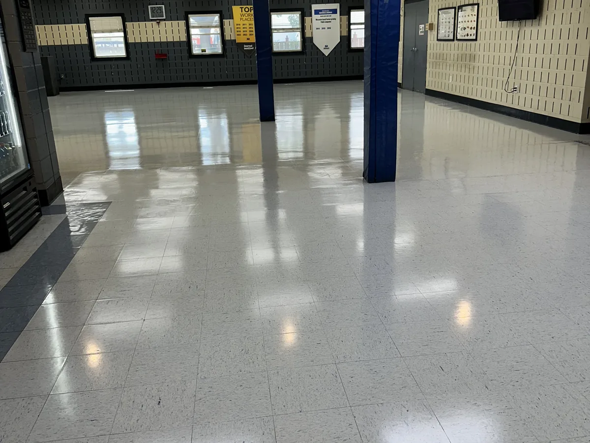 Polished white VCT floor in a retail showroom