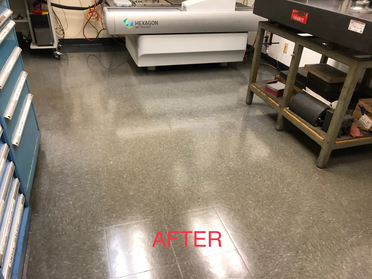 Stripped and waxed VCT floor in a workshop